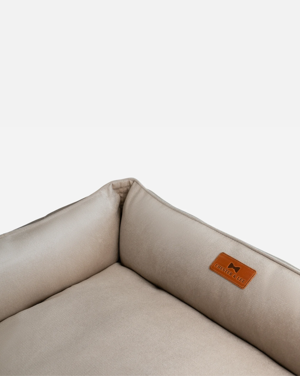 Classic velvet sleeper dog bed in beige