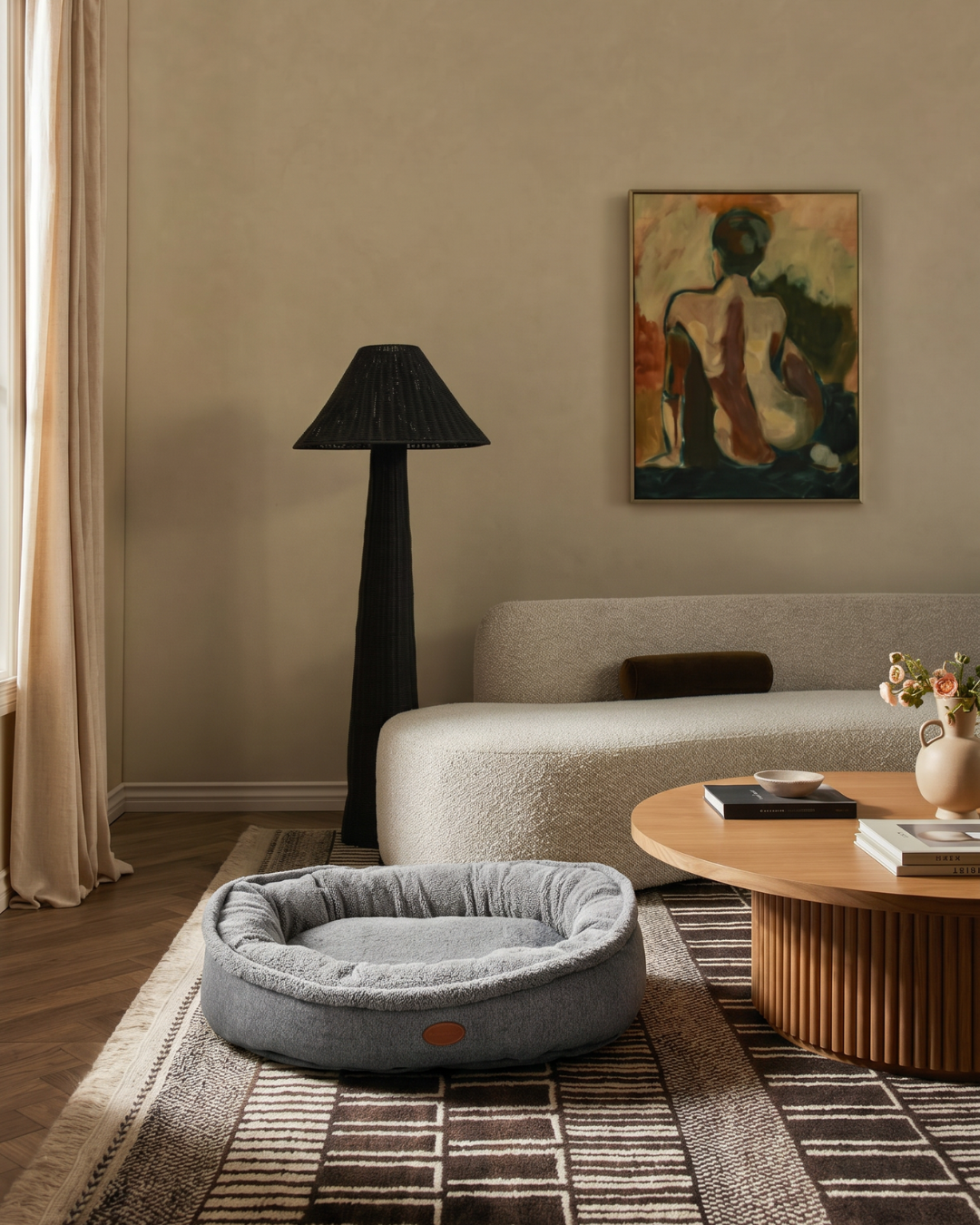 Furry bagel dog bed with faux shearling interior and velvet shell