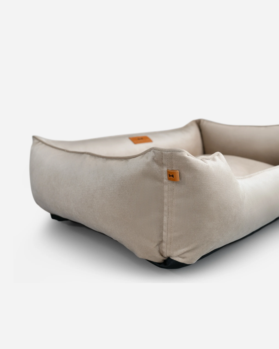 Classic velvet sleeper dog bed in beige