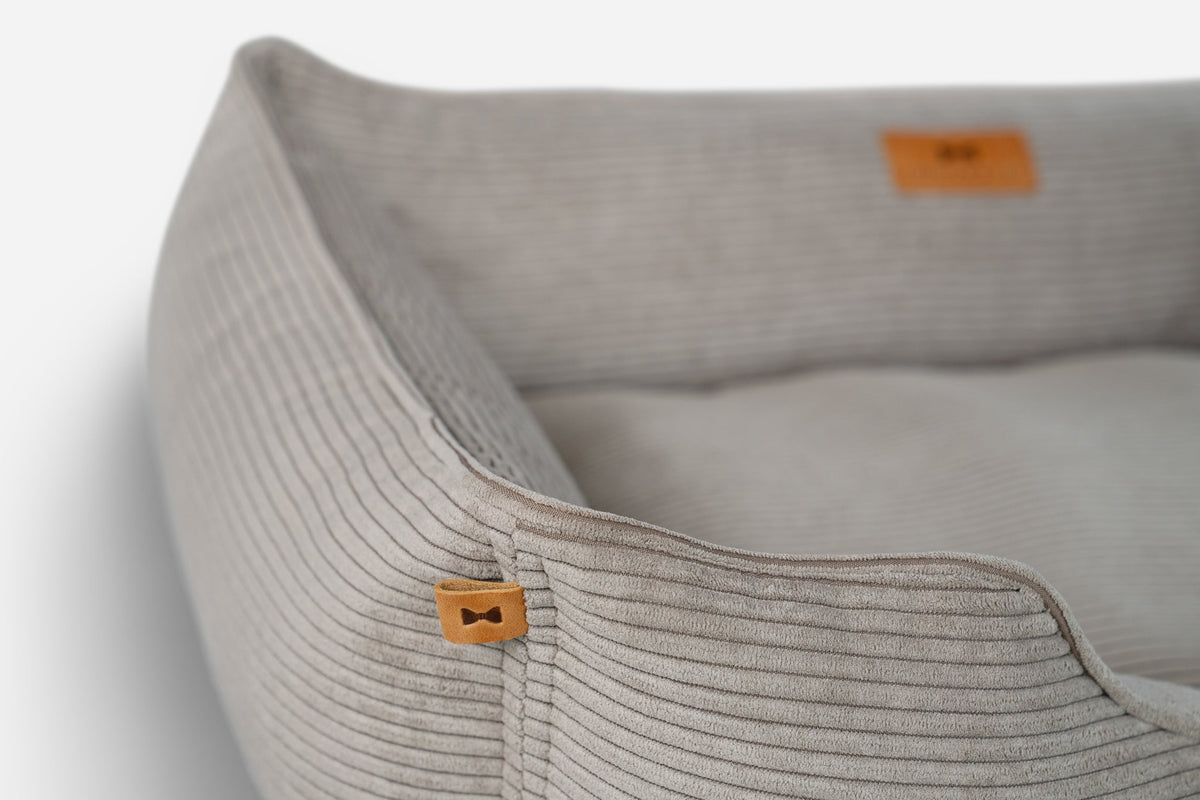 Taupe corduroy sleeper dog bed