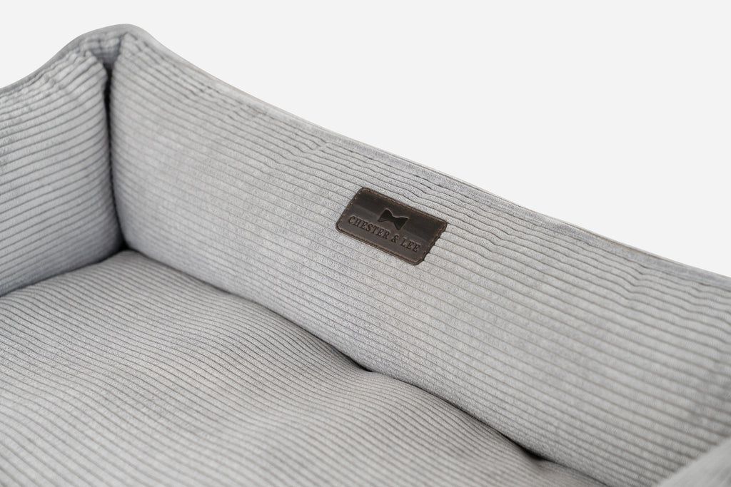 Fancy corduroy sleeper dog bed in gray