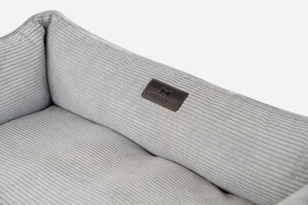 Fancy corduroy sleeper dog bed in gray