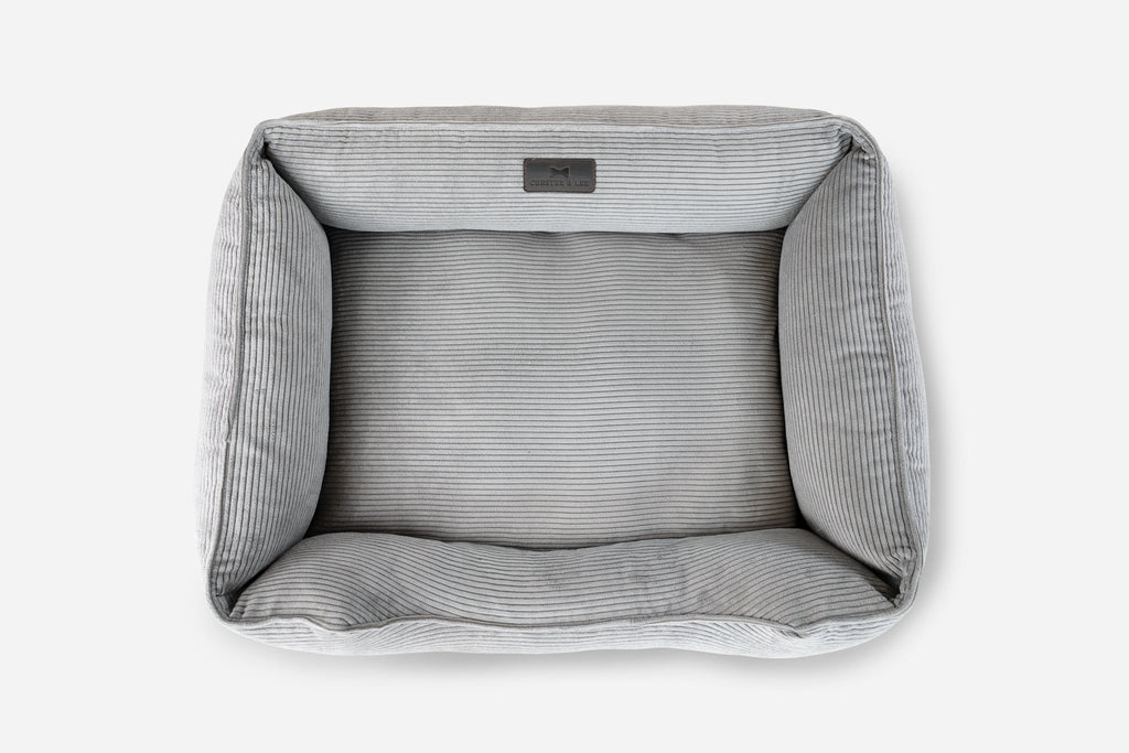 Fancy corduroy sleeper dog bed in gray