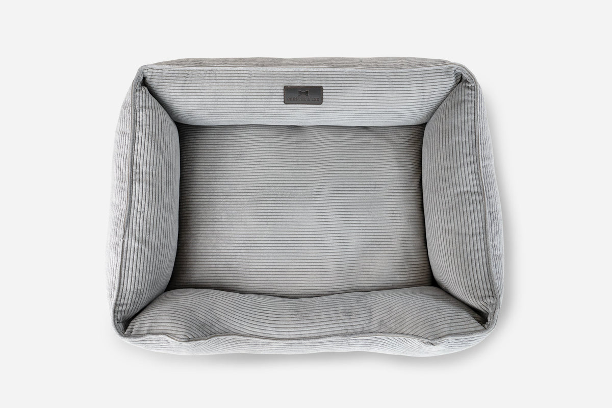 Fancy corduroy sleeper dog bed in gray