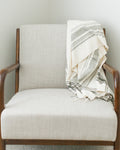 Handwoven cotton throw blanket in natural tones